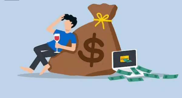 10 freelance side hustle:Man with a glass of wine chilling on his Freelance pay.